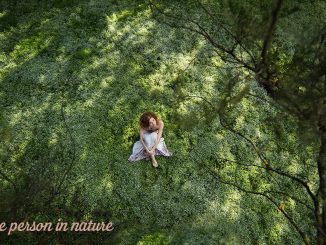 Reflective person in nature